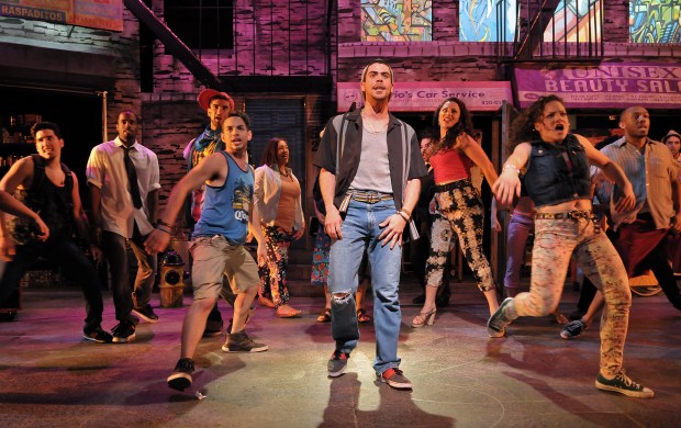 Diego Klock-Perez as Usnavi (center) in a scene from the SpeakEasy Stage Company production of IN THE HEIGHTS, extended now thru June 16 at the Stanford Calderwood Pavilion at the Boston Center for the Arts, 527 Tremont Street in Boston’s South End. Tix/Info: 617-933-8600 or www.SpeakEasyStage.com. Photo: Craig Bailey/Perspective Photo.