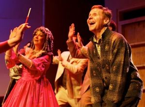 Danny Bolton (Man in Chair) an th cast in a scene from "The Drowsy Chaperone." Photo: Zoe Bradford