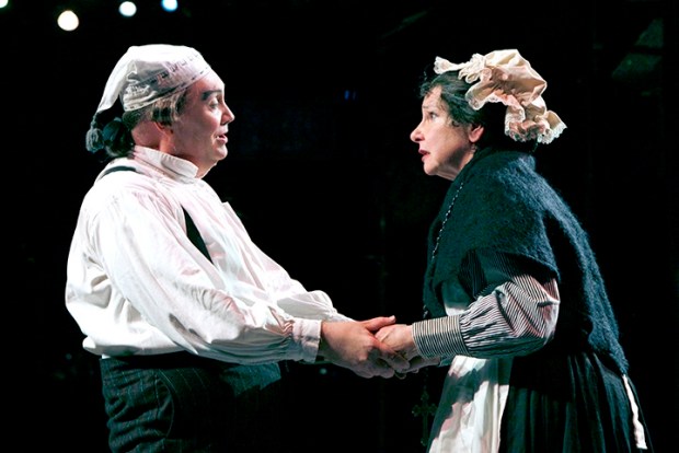 David Coffee as Ebenzer Scrooge and Cheryl McMahon as Mrs. Dilber in "A Christmas Carol." Photo: Paul Lyden