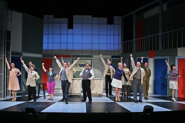 Cast members performing “The Company Way” in Stoneham Theatre’s production of HOW TOSUCCEED… Photo credit: Mark S. Howard 