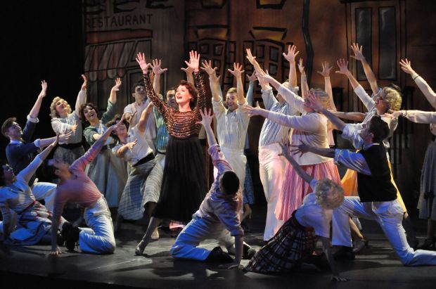 Katie Anne Clark (center) as Ruth and members  of the ensemble of “Wonderful Town.” Herb Philpott/Reagle Music Theatre 