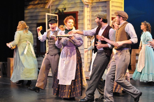 Leigh Barrett as Nettie Fowler (center) and ensemble members from “Carousel.” Courtesy Reagle Music Theatre/©Herb Philpott